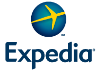 Expedia sees profits slip, but shares rise